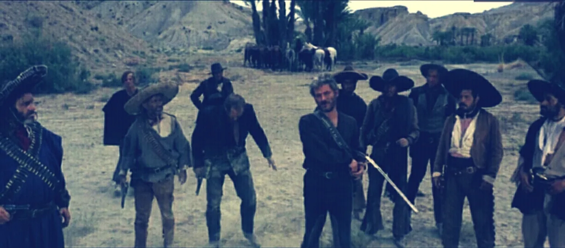 Klaus Kinski, Gian Maria Volontè, Werner Abrolat, Mario Brega, Antonio Molino Rojo, Panos Papadopulos, Luigi Pistilli, Luis Rodríguez, Aldo Sambrell, Benito Stefanelli, Enrique Santiago, and Eduardo García in For a Few Dollars More (1965)