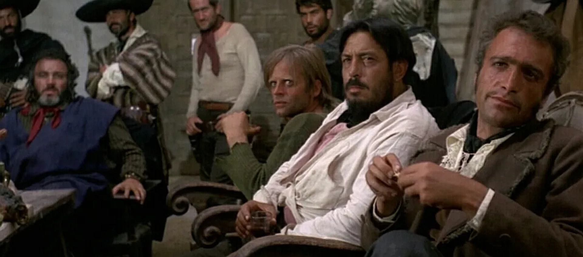 Klaus Kinski, Werner Abrolat, Mario Brega, José Canalejas, Nazzareno Natale, Luigi Pistilli, Luis Rodríguez, and Enrique Santiago in For a Few Dollars More (1965)