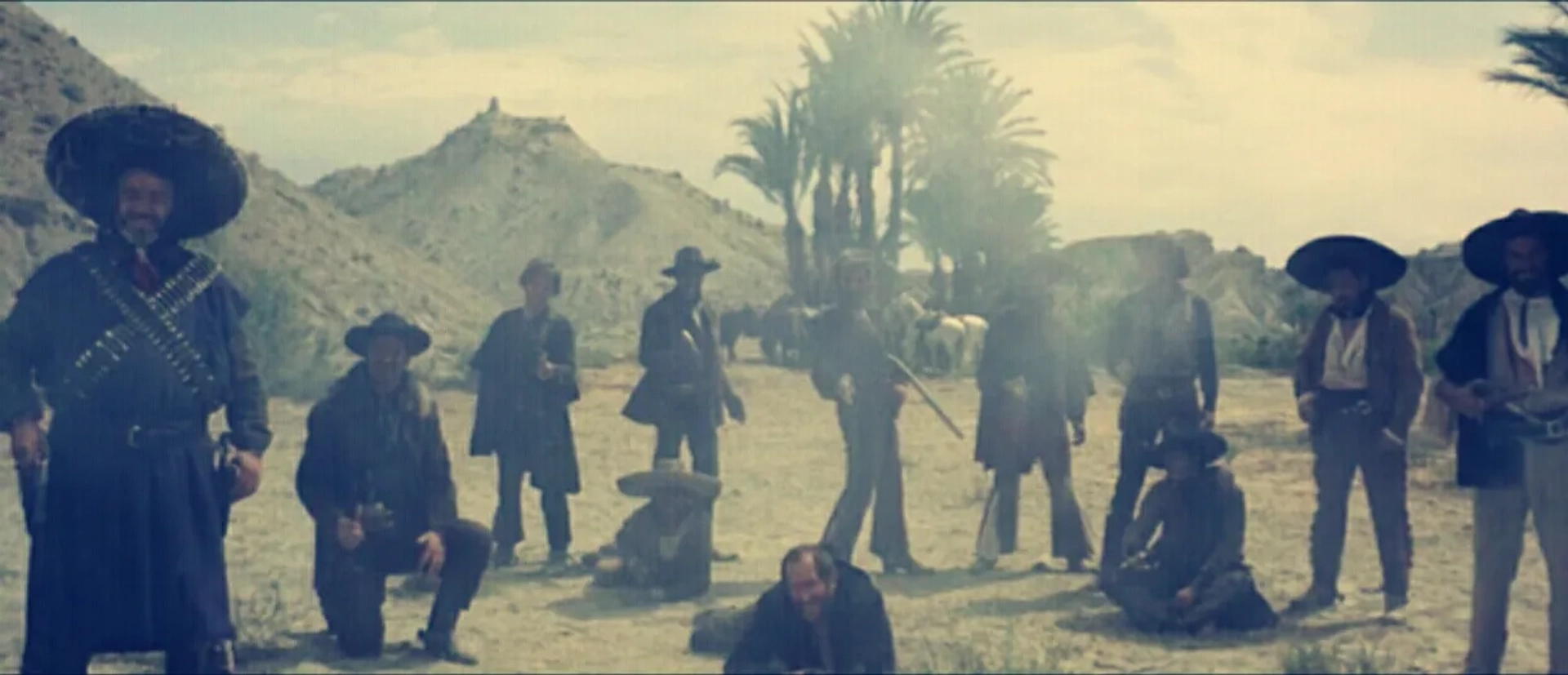 Klaus Kinski, Lee Van Cleef, Gian Maria Volontè, Werner Abrolat, Mario Brega, Antonio Molino Rojo, Panos Papadopulos, Luigi Pistilli, Luis Rodríguez, Aldo Sambrell, Benito Stefanelli, and Enrique Santiago in For a Few Dollars More (1965)