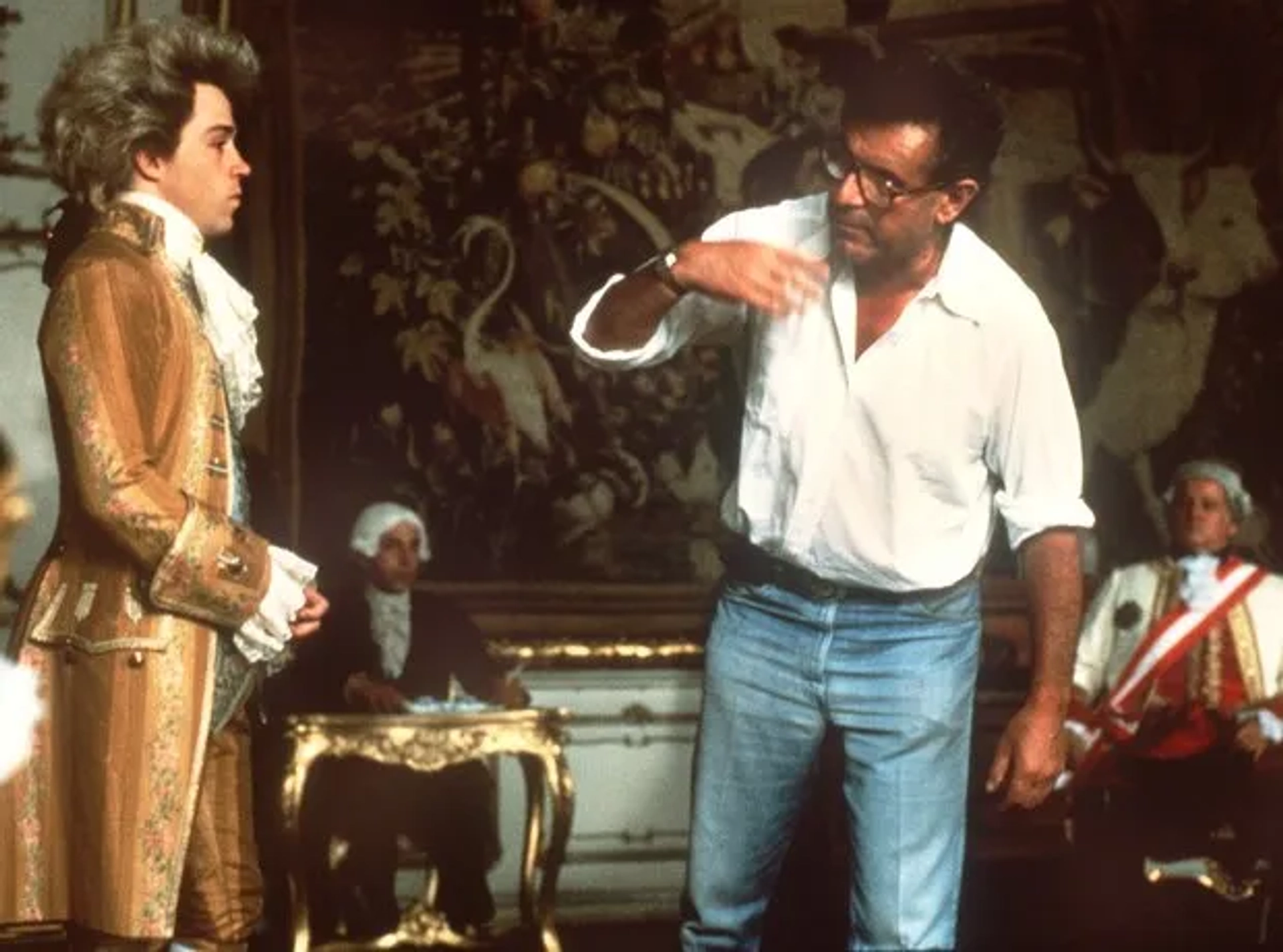 Milos Forman and Tom Hulce in Amadeus (1984)