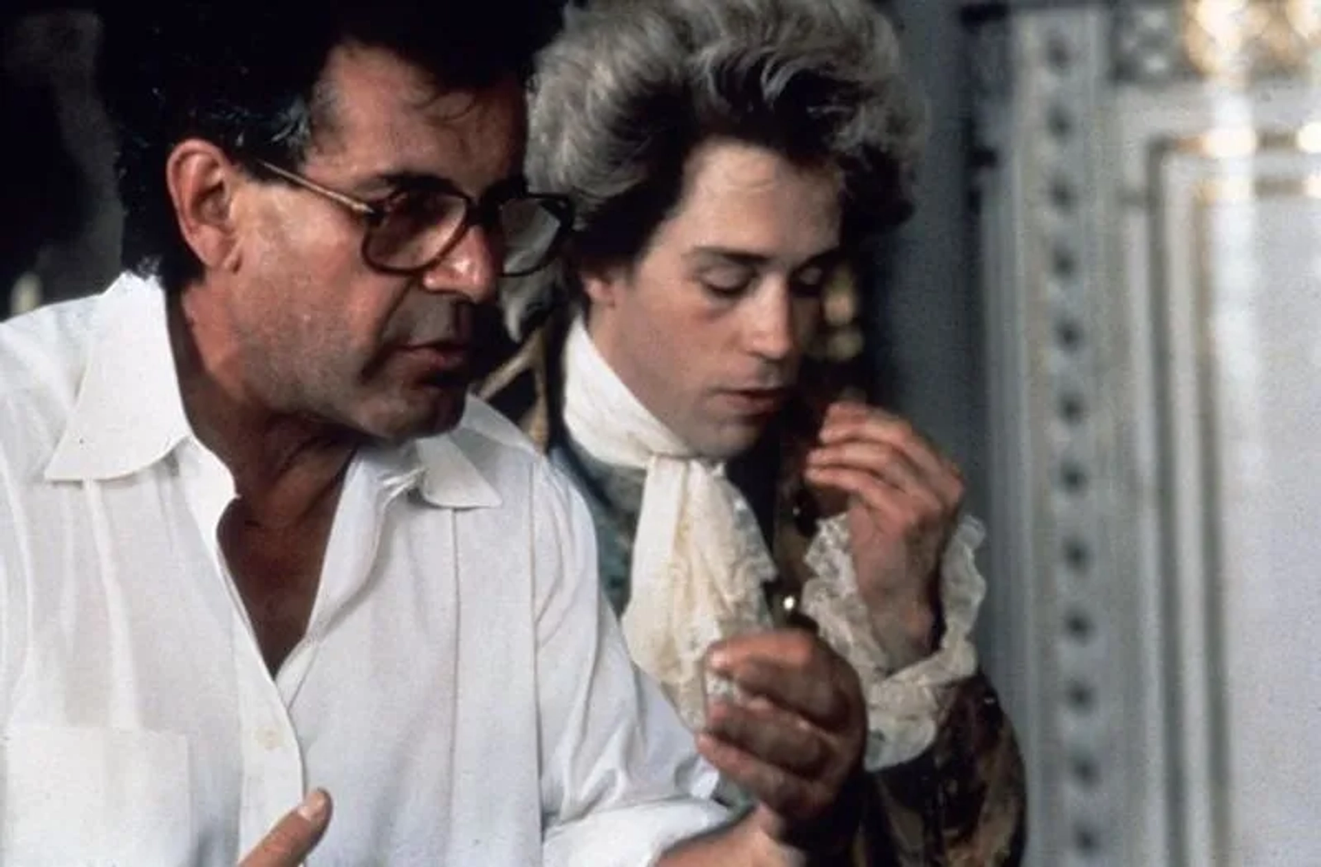 Milos Forman and Tom Hulce in Amadeus (1984)