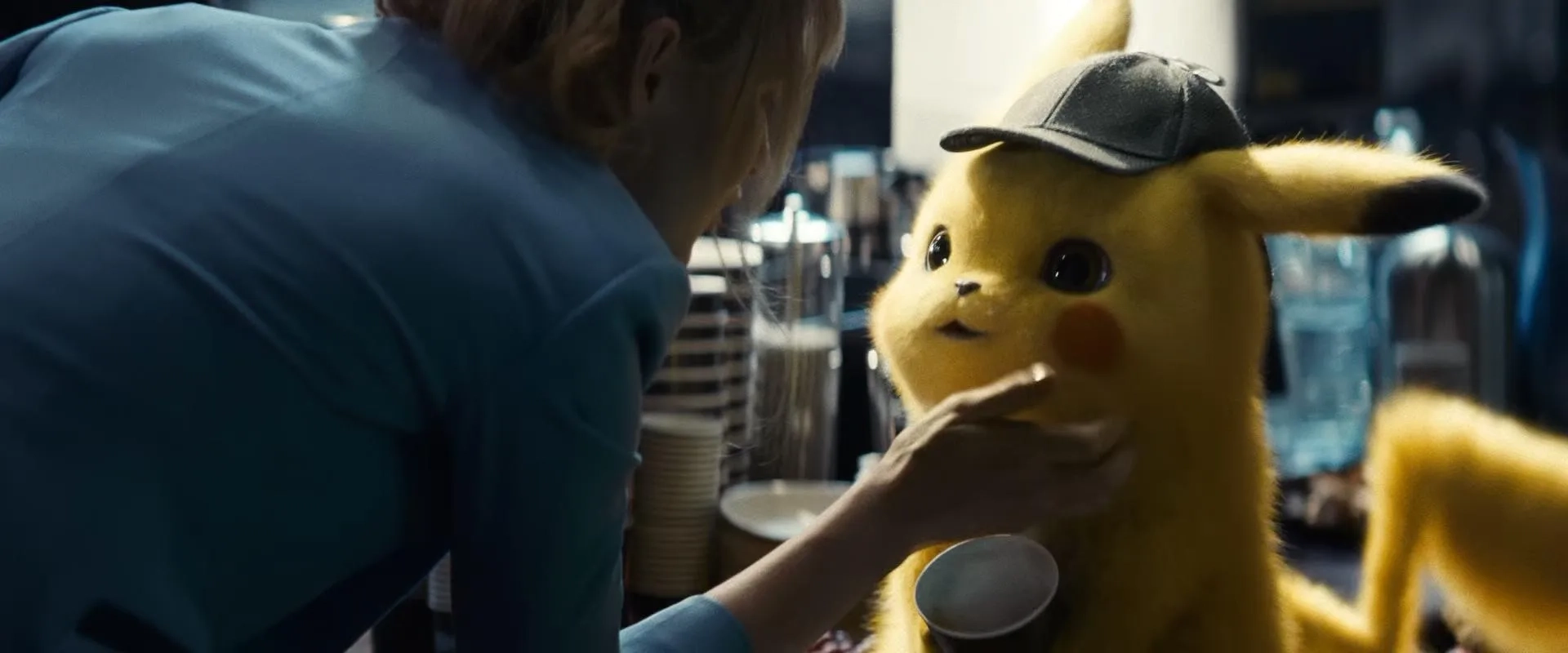 Ryan Reynolds and Kathryn Newton in Pokémon: Detective Pikachu (2019)