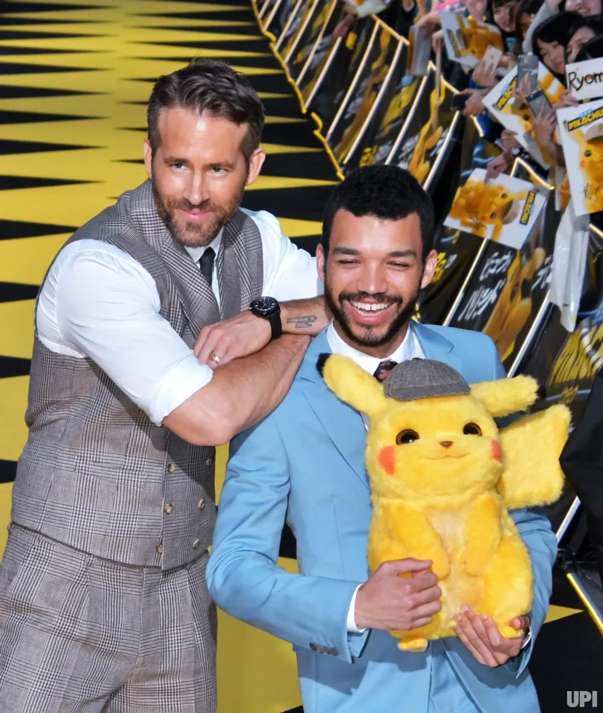 Ryan Reynolds and Justice Smith at an event for Pokémon: Detective Pikachu (2019)