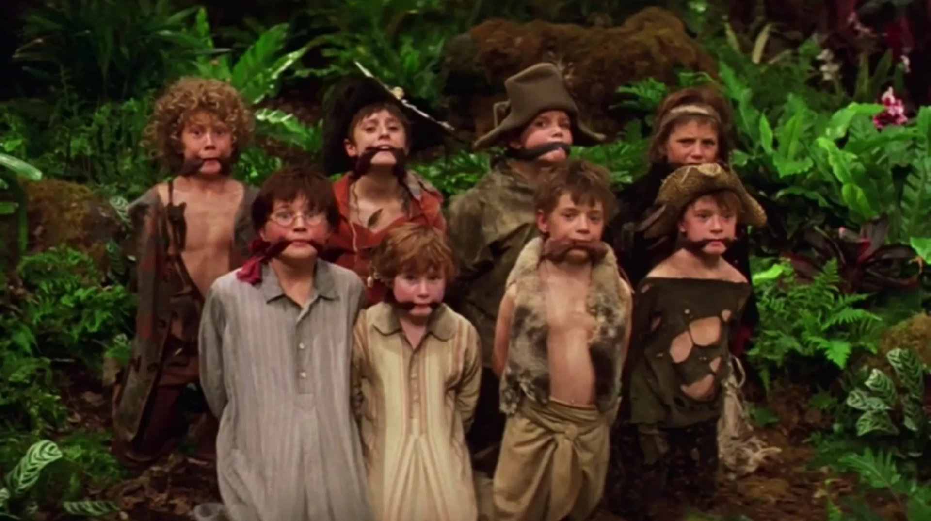 Harry Eden, George MacKay, Harry Newell, Freddie Popplewell, Rupert Simonian, Theodore Chester, Lachlan Gooch, and Patrick Gooch in Peter Pan (2003)