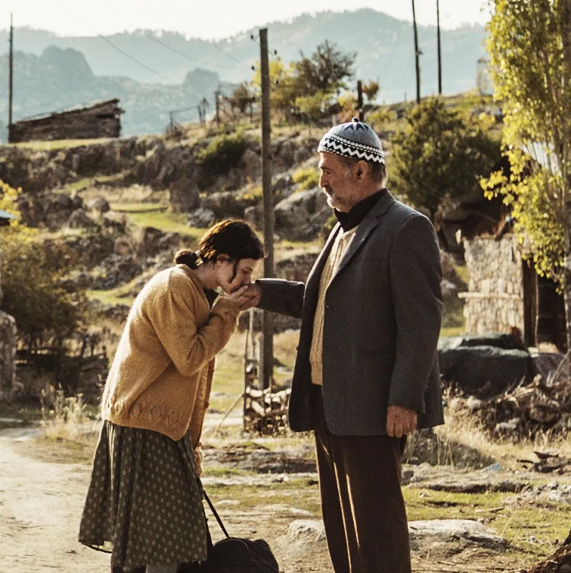 Ece Yüksel and Müfit Kayacan in A Tale of Three Sisters (2019)