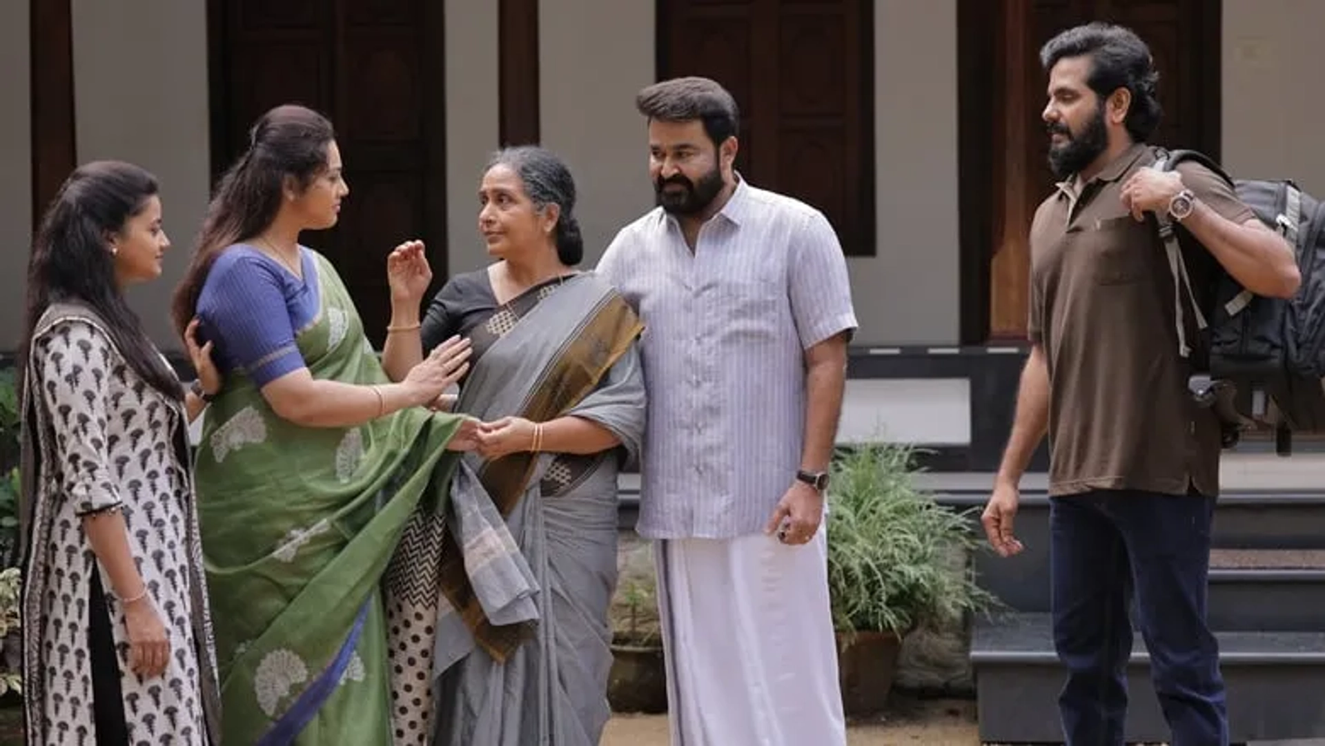 Mohanlal, Meena, and Ansiba in Drishyam 2 (2021)