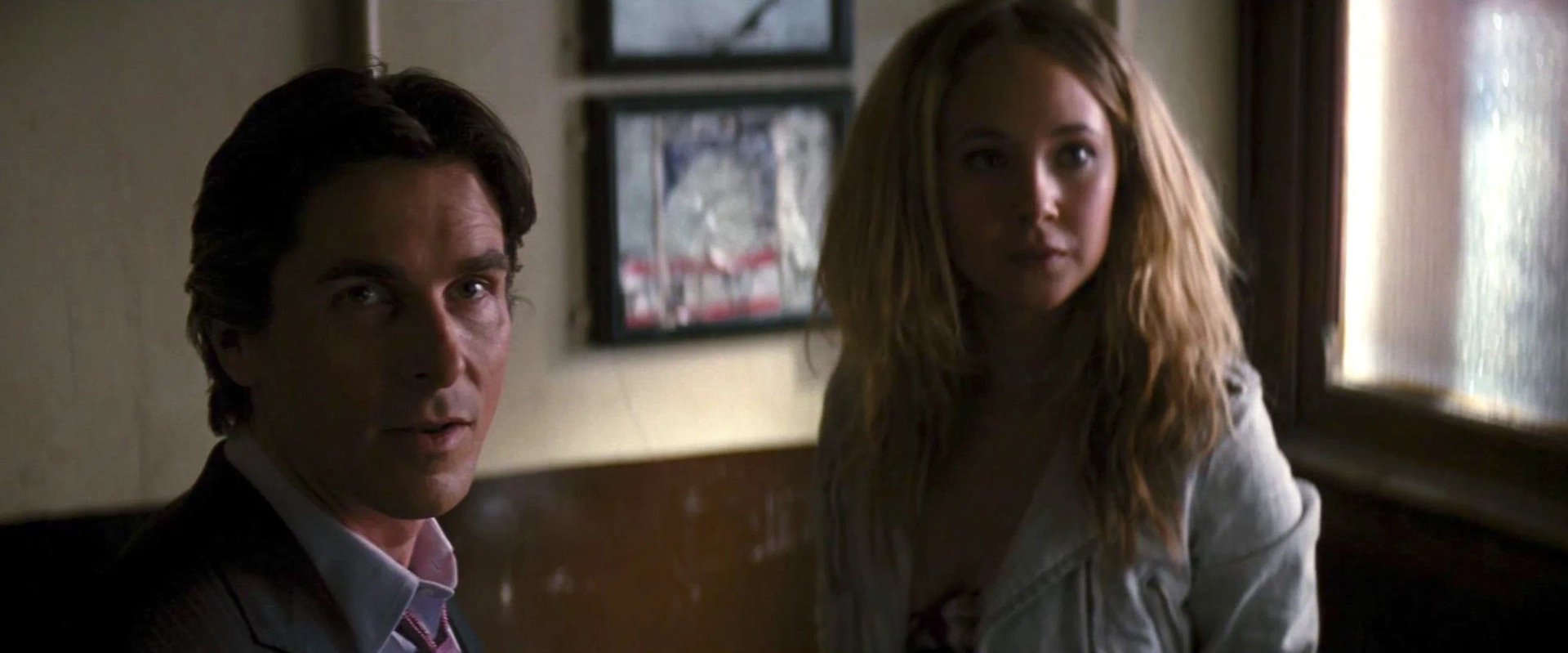 Christian Bale and Juno Temple in The Dark Knight Rises (2012)
