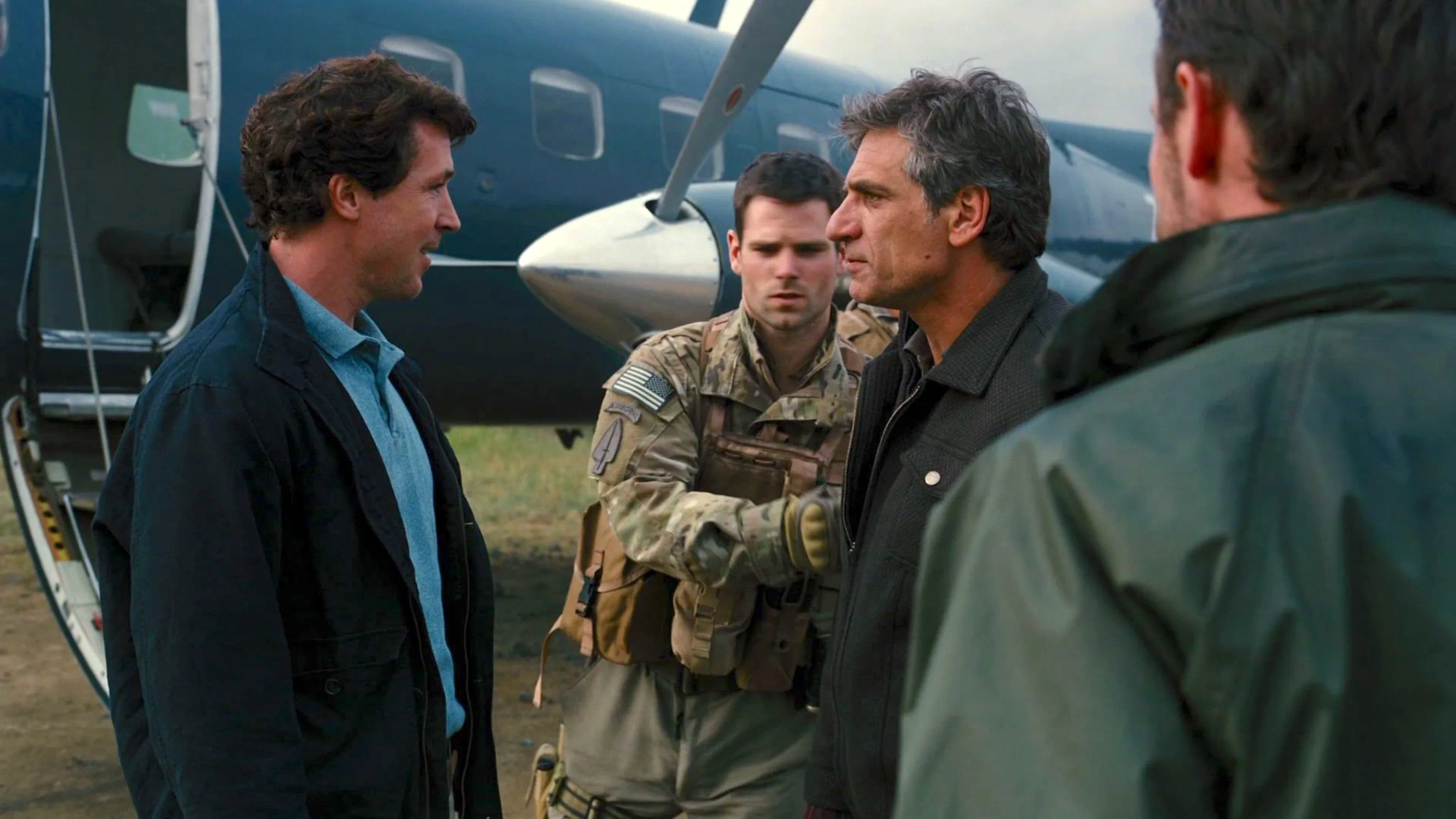 Alon Aboutboul, Aidan Gillen, Sam Kennard, and Josh Stewart in The Dark Knight Rises (2012)