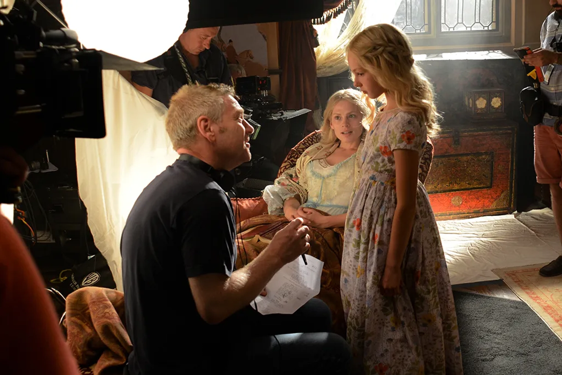 Eloise Webb, Kenneth Branagh and Hayley Attwell on the set of Cinderella