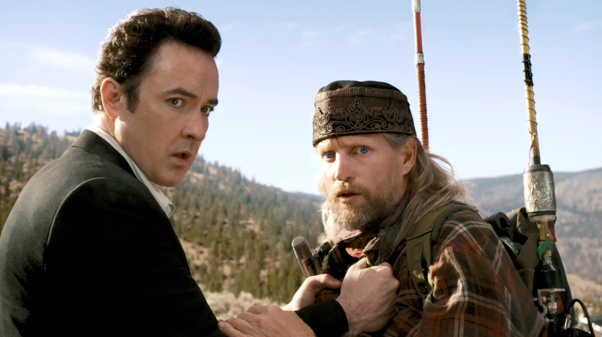 John Cusack and Woody Harrelson in 2012 (2009)
