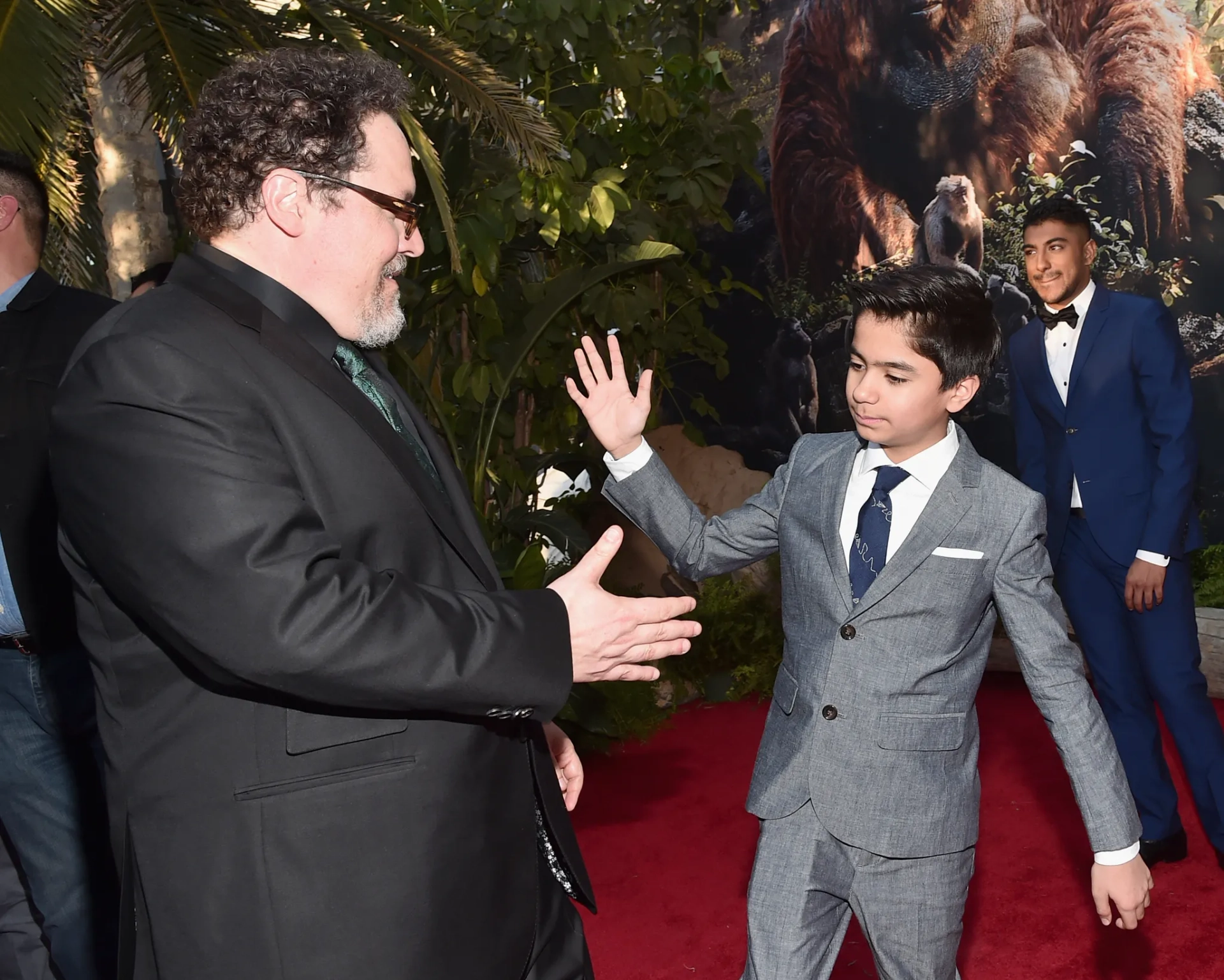 Jon Favreau, Ritesh Rajan, and Neel Sethi at an event for The Jungle Book (2016)