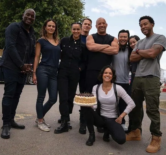 Vin Diesel, Jordana Brewster, Justin Lin, Ludacris, Michelle Rodriguez, Tyrese Gibson, John Cena, Nathalie Emmanuel, and Anna Sawai in F9: The Fast Saga (2021)