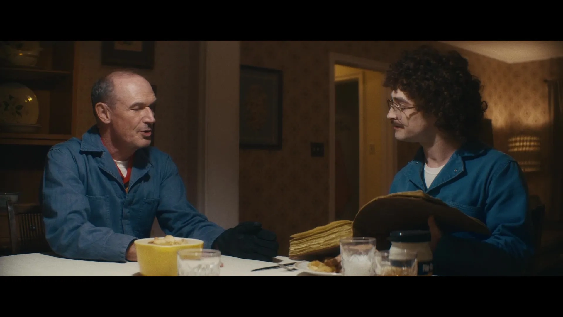 Toby Huss and Daniel Radcliffe in Weird: The Al Yankovic Story (2022)