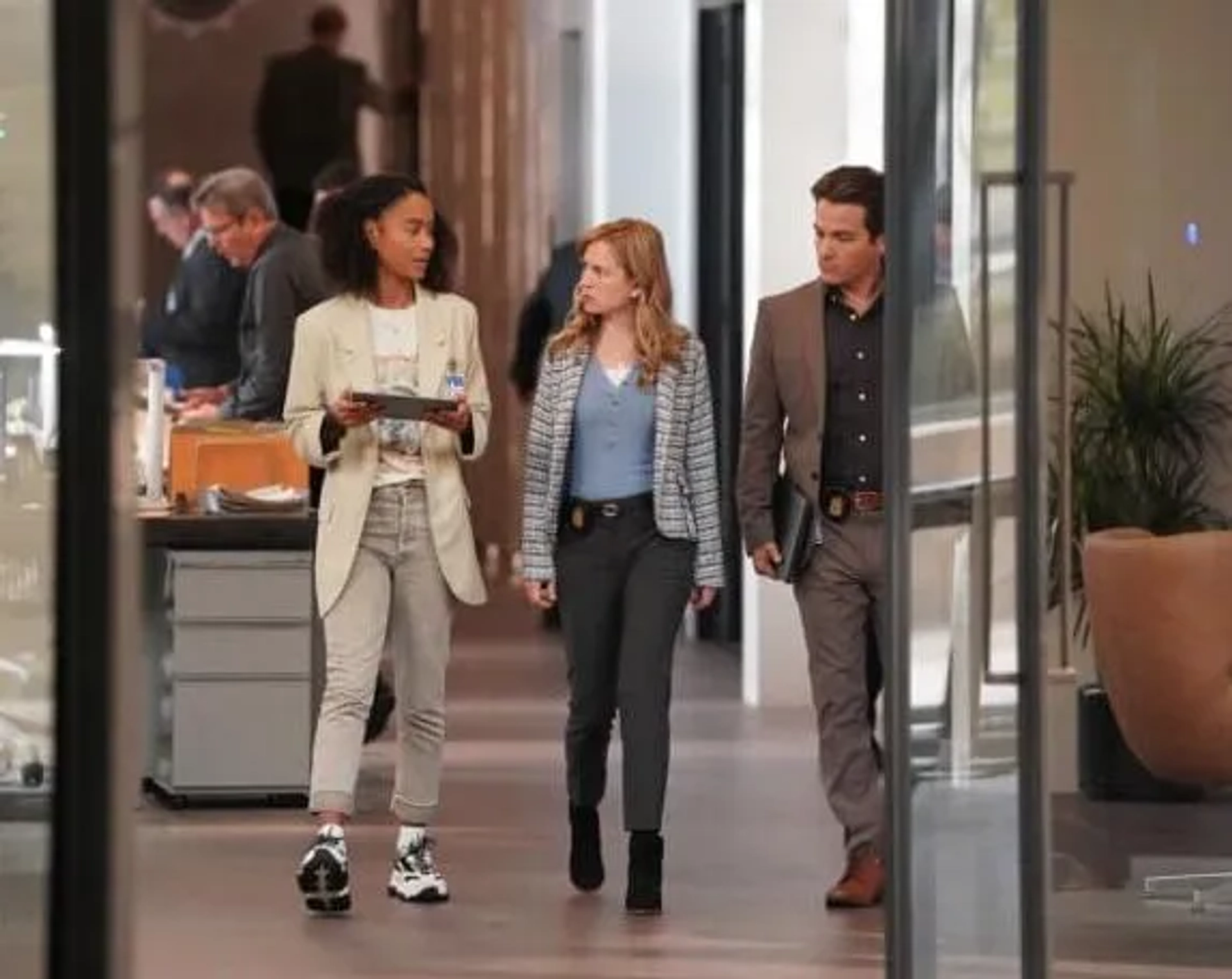 Kevin Zegers, Britt Robertson, and Michelle Núñez in The Rookie: Feds (2022)