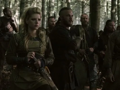 Gustaf Skarsgård, Katheryn Winnick, Travis Fimmel, and Diarmaid Murtagh in Vikings: Trial (2013)