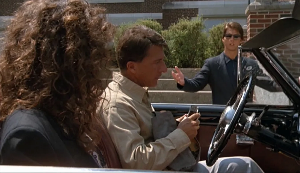 Tom Cruise, Dustin Hoffman, and Valeria Golino in Rain Man (1988)