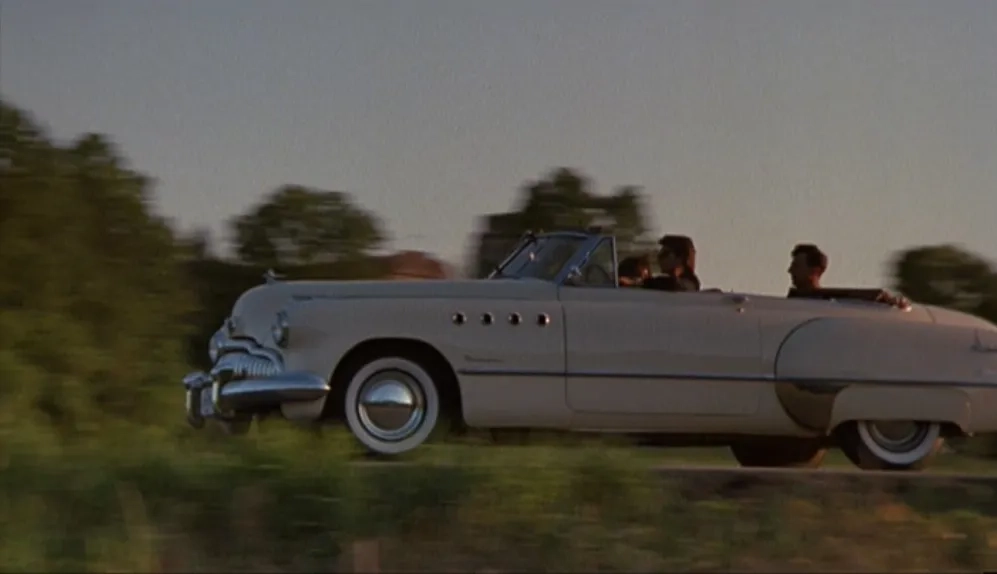 Tom Cruise, Dustin Hoffman, and Valeria Golino in Rain Man (1988)