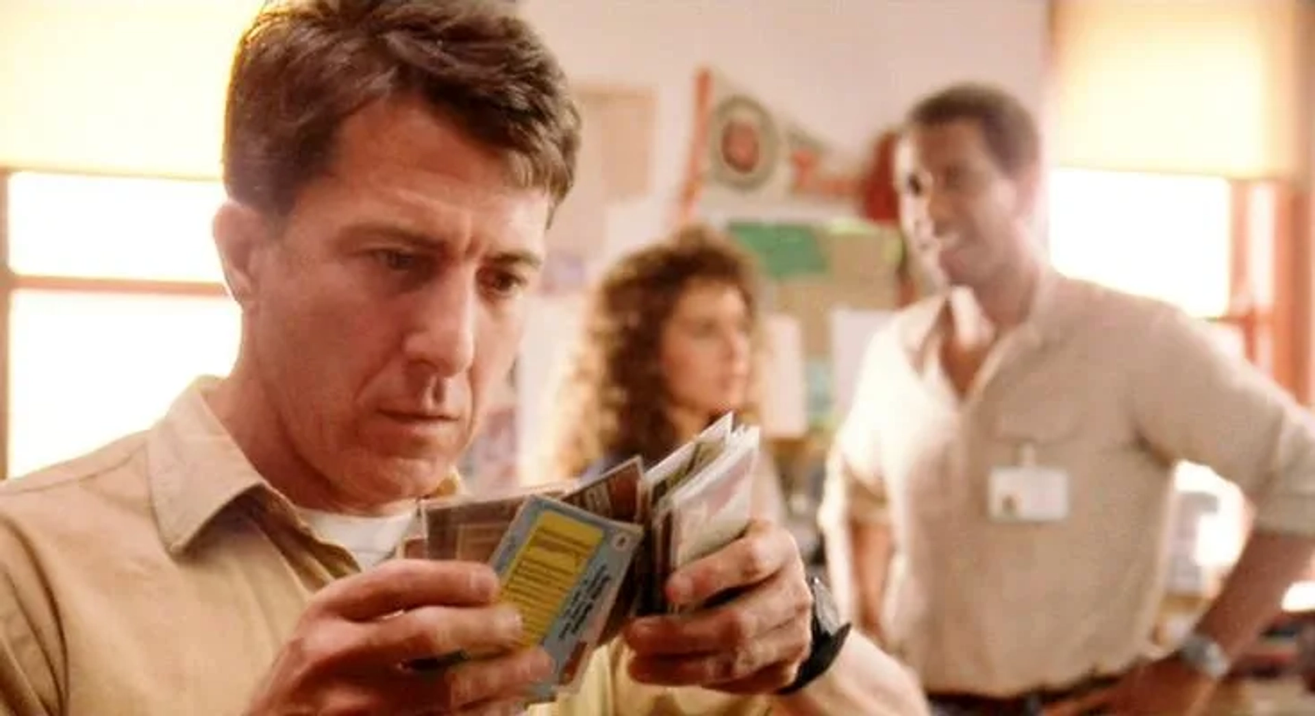 Still of Michael D. Roberts, Dustin Hoffman and Valeria Golino in Rain Man.