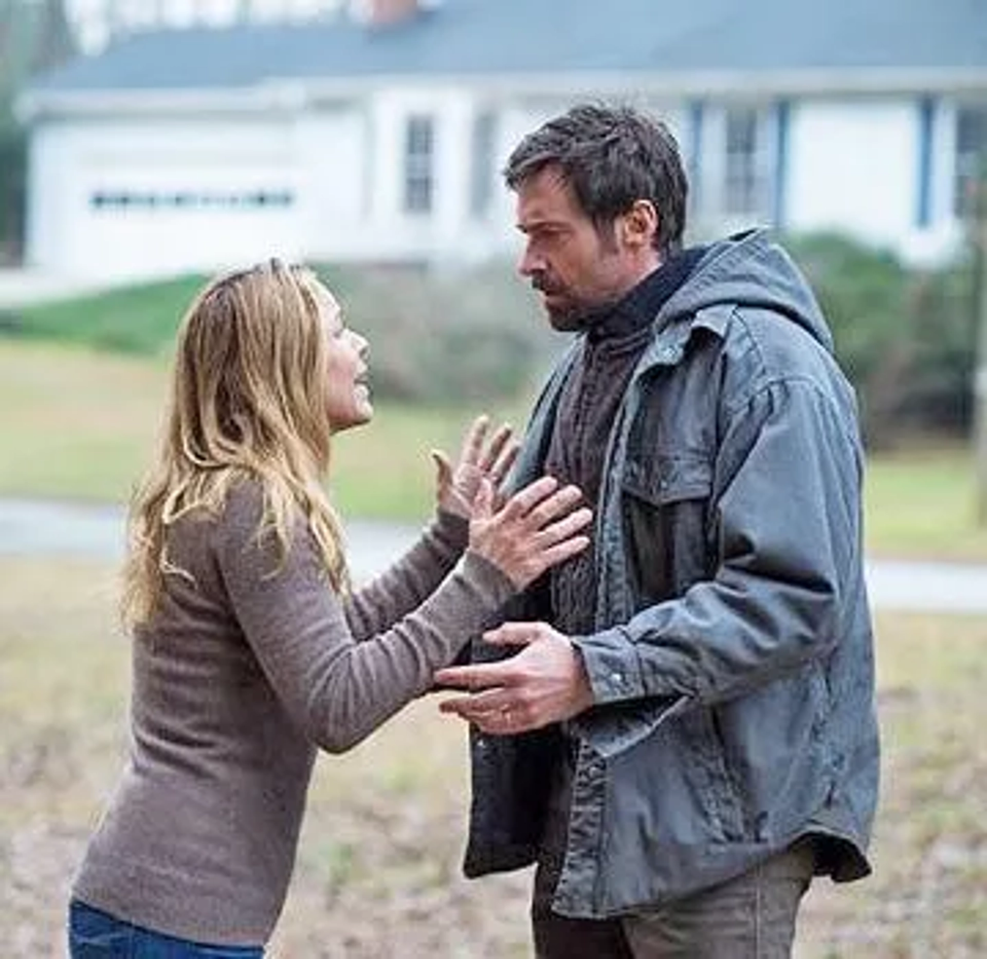 Maria Bello and Hugh Jackman in Prisoners (2013)