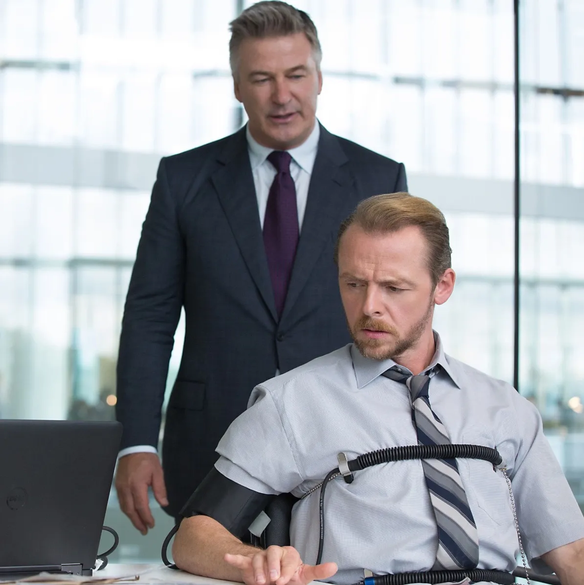 Alec Baldwin and Simon Pegg in Mission: Impossible - Rogue Nation (2015)