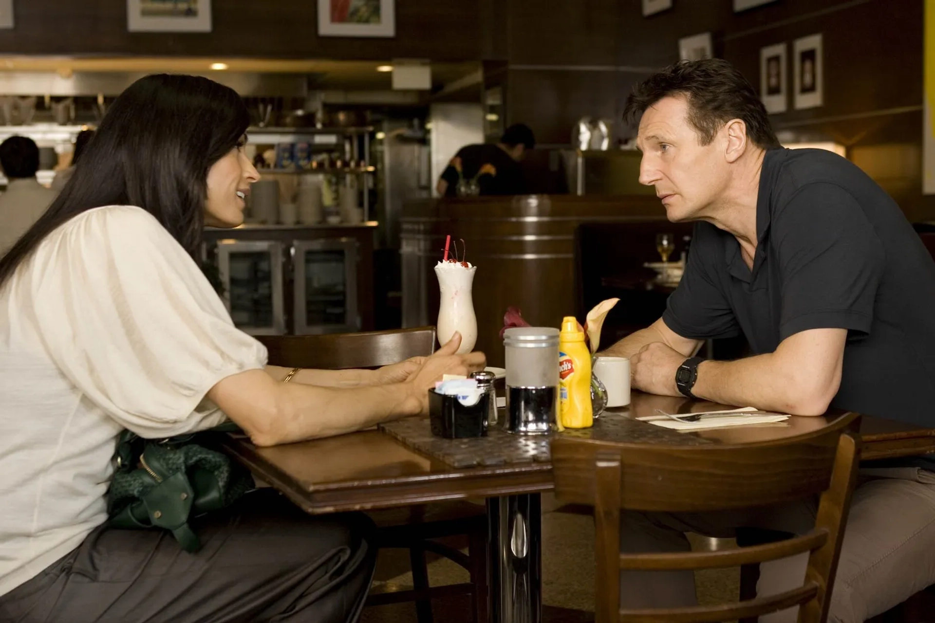 Famke Janssen and Liam Neeson in Taken (2008)