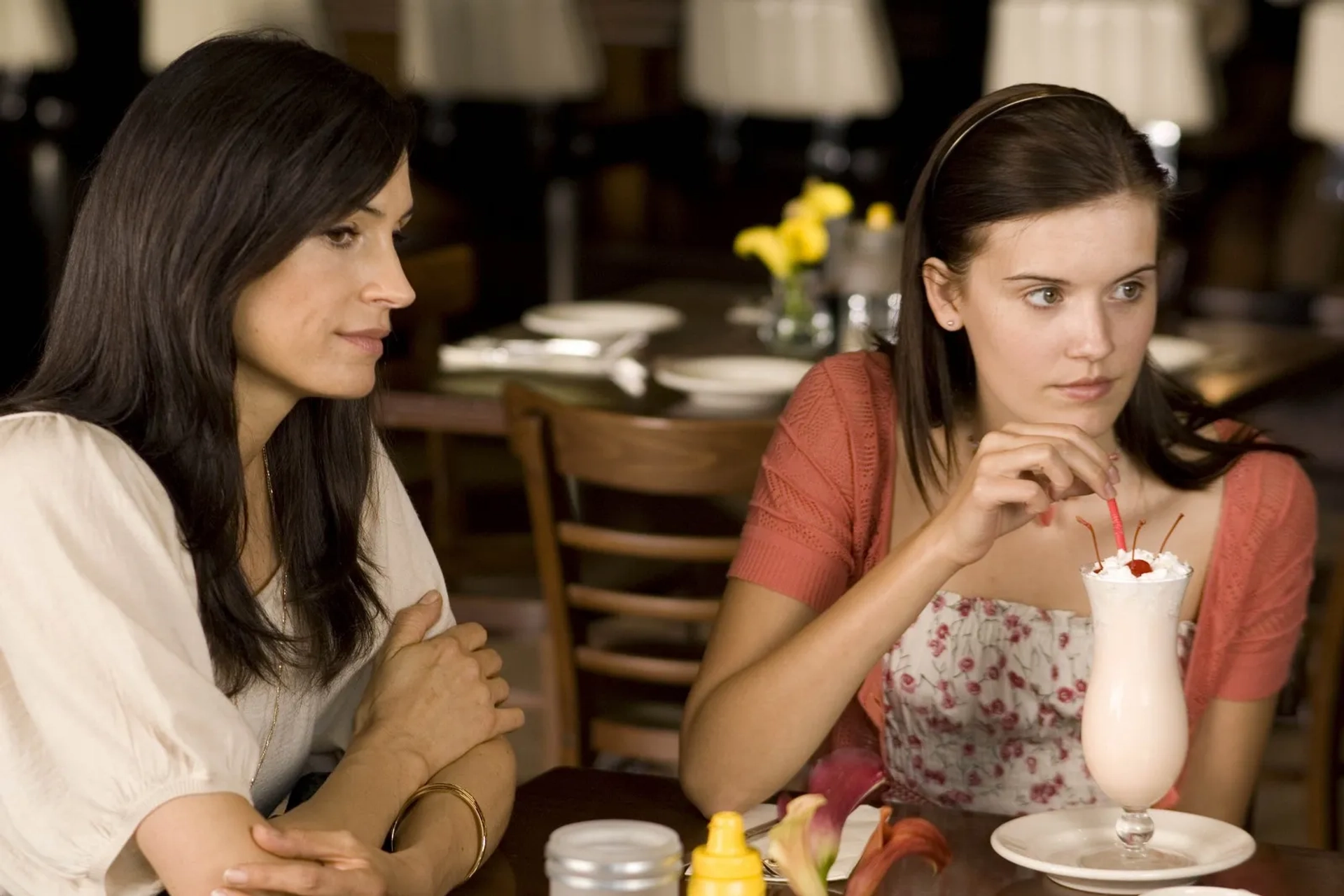 Famke Janssen and Maggie Grace in Taken (2008)