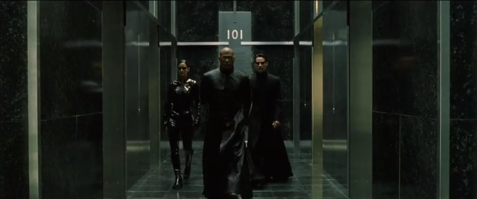 Keanu Reeves, Laurence Fishburne, and Carrie-Anne Moss in The Matrix Reloaded (2003)