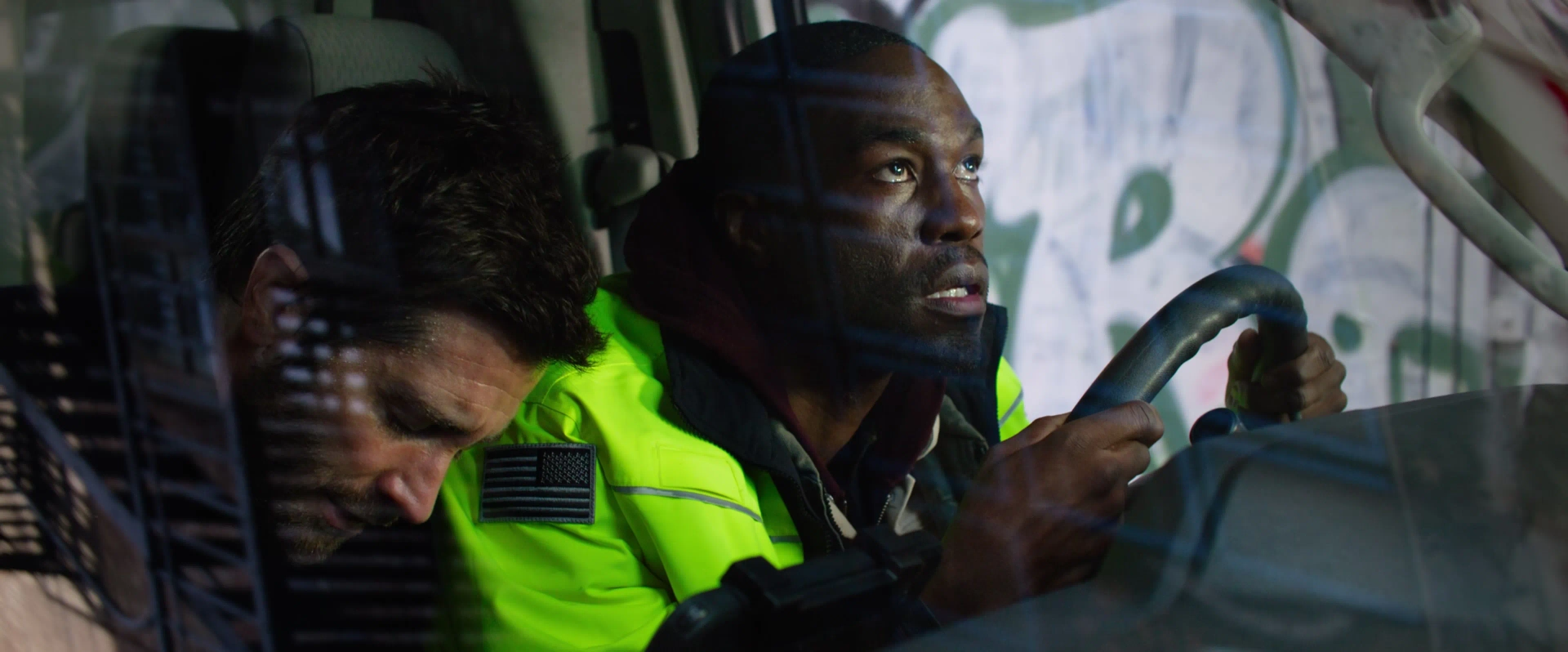 Jake Gyllenhaal and Yahya Abdul-Mateen II in Ambulance (2022)