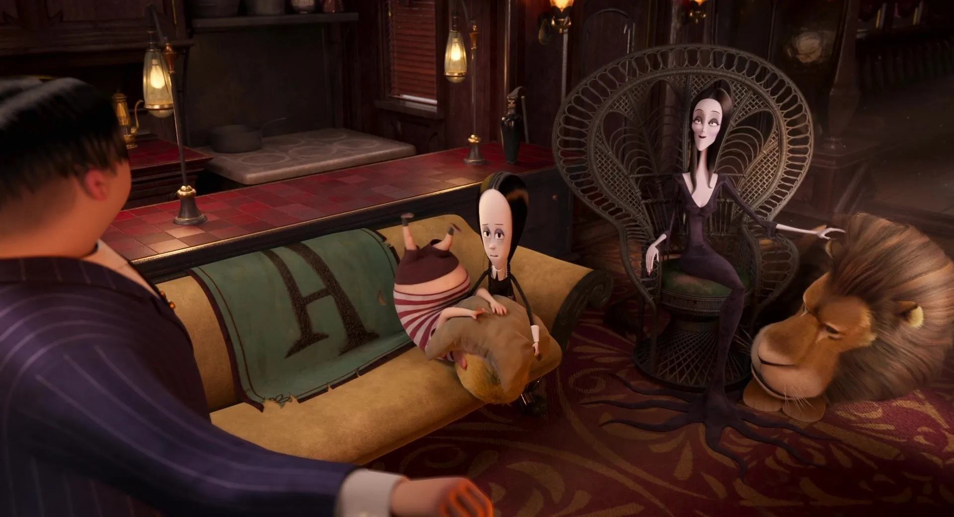 Charlize Theron, Oscar Isaac, Chloë Grace Moretz, and Javon 'Wanna' Walton in The Addams Family 2 (2021)