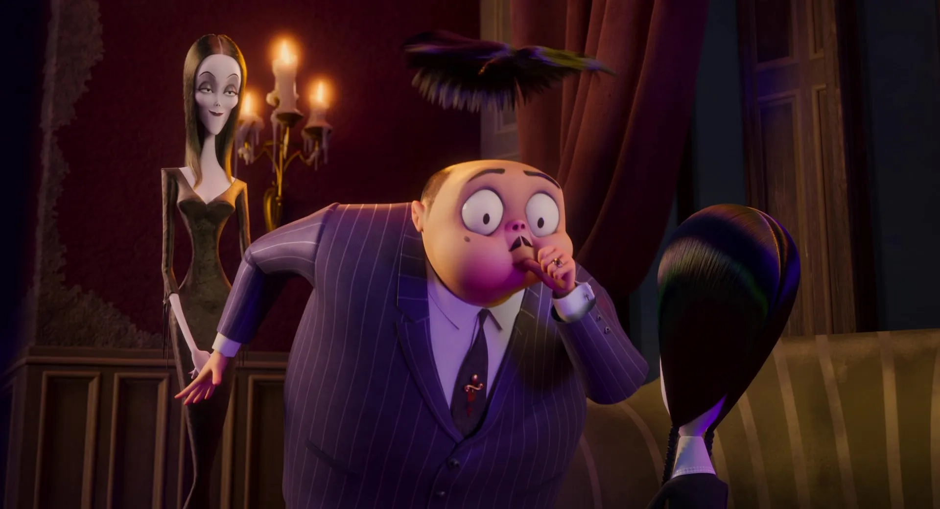 Charlize Theron, Oscar Isaac, and Chloë Grace Moretz in The Addams Family 2 (2021)