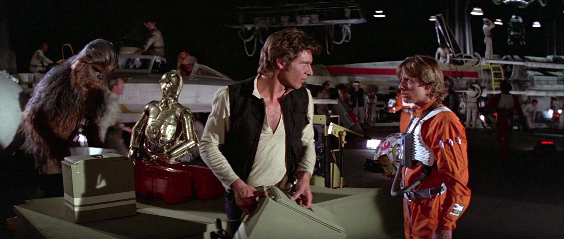 Harrison Ford, Anthony Daniels, Mark Hamill, Peter Mayhew, and Shane Rimmer in Star Wars: Episode IV - A New Hope (1977)