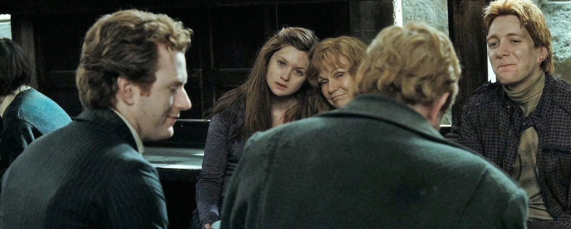 Chris Rankin, Julie Walters, Mark Williams, Bonnie Wright, and Oliver Phelps in Harry Potter and the Deathly Hallows: Part 2 (2011)