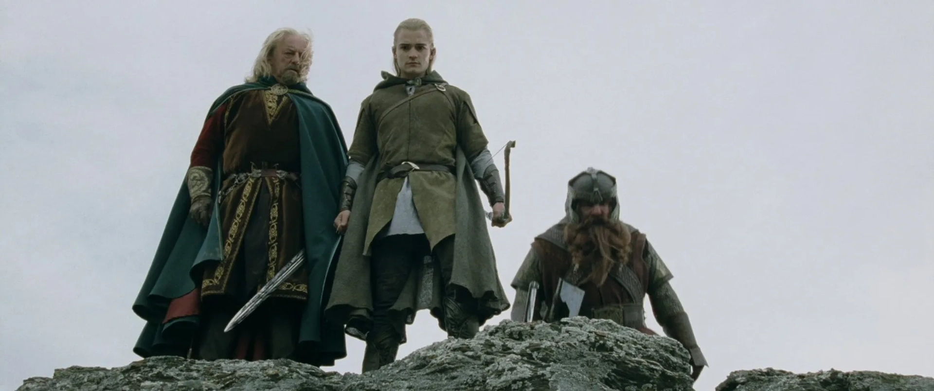 Orlando Bloom, Bernard Hill, and John Rhys-Davies in The Lord of the Rings: The Two Towers (2002)