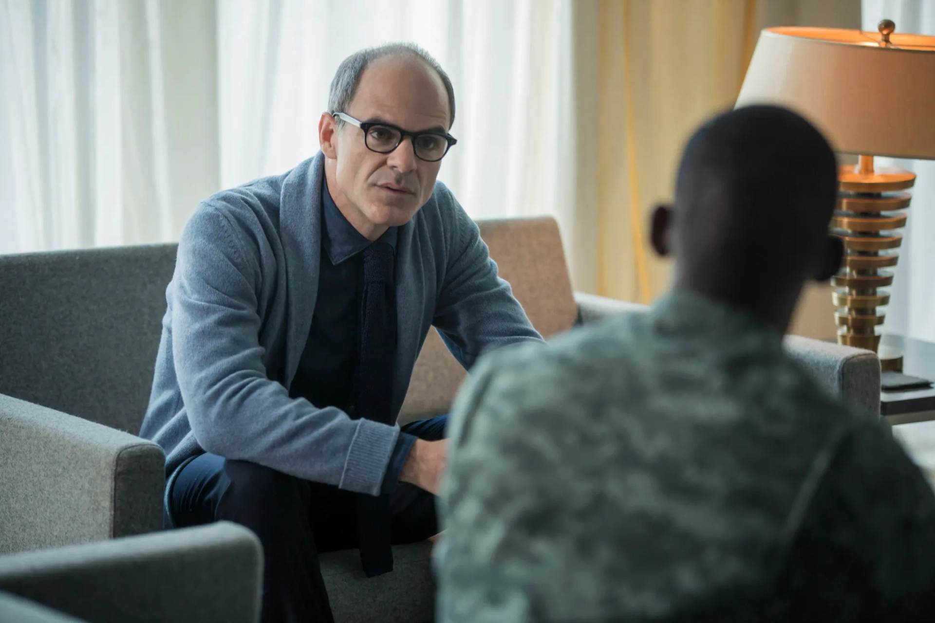 Michael Kelly and Malachi Kirby in Black Mirror (2011)