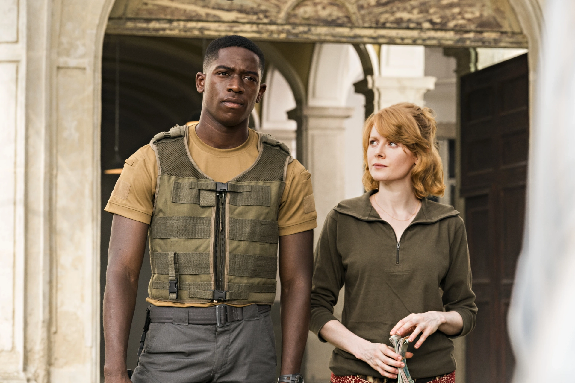 Emily Beecham and Damson Idris in Outside the Wire (2021)