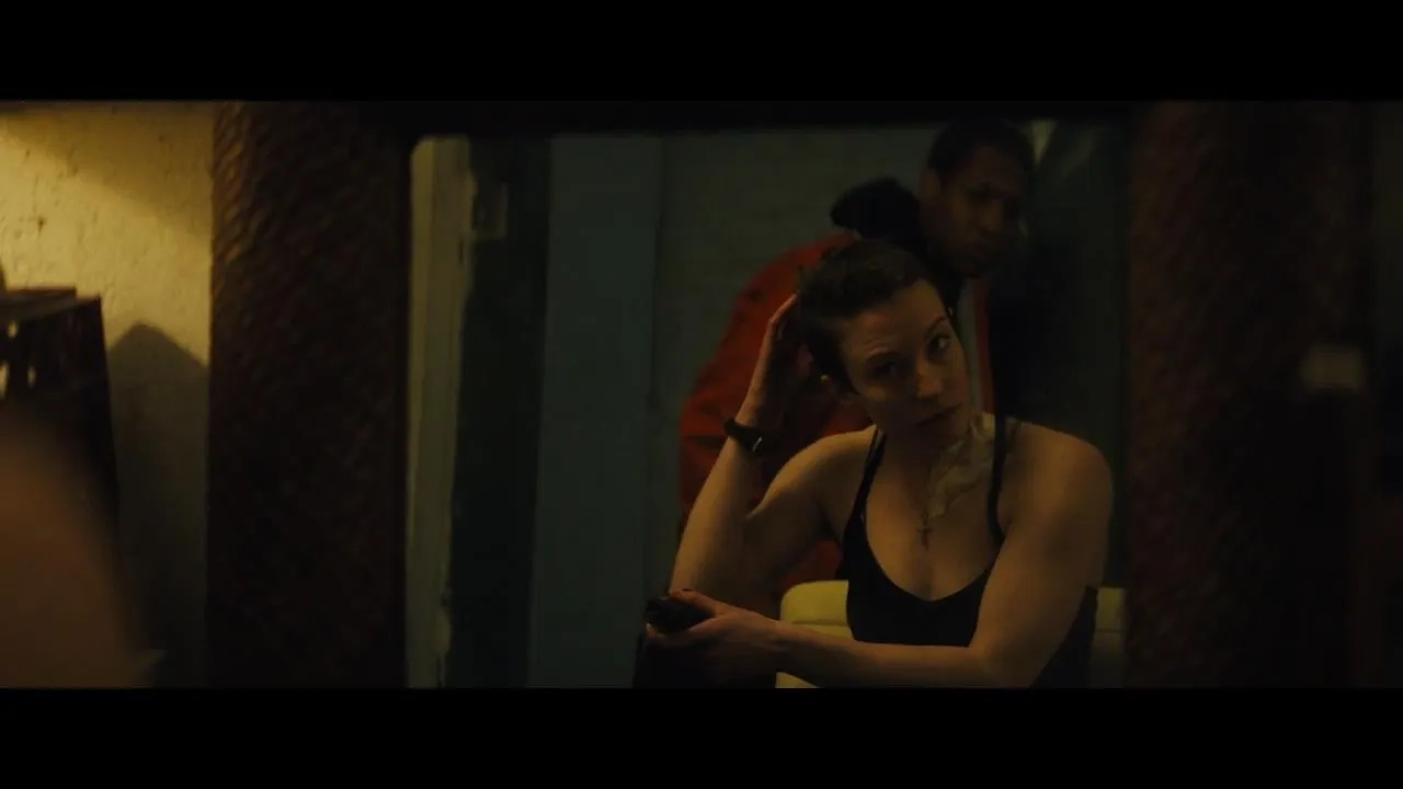 Jonathan Majors and Caitlin Ewald in Captive State (2019)