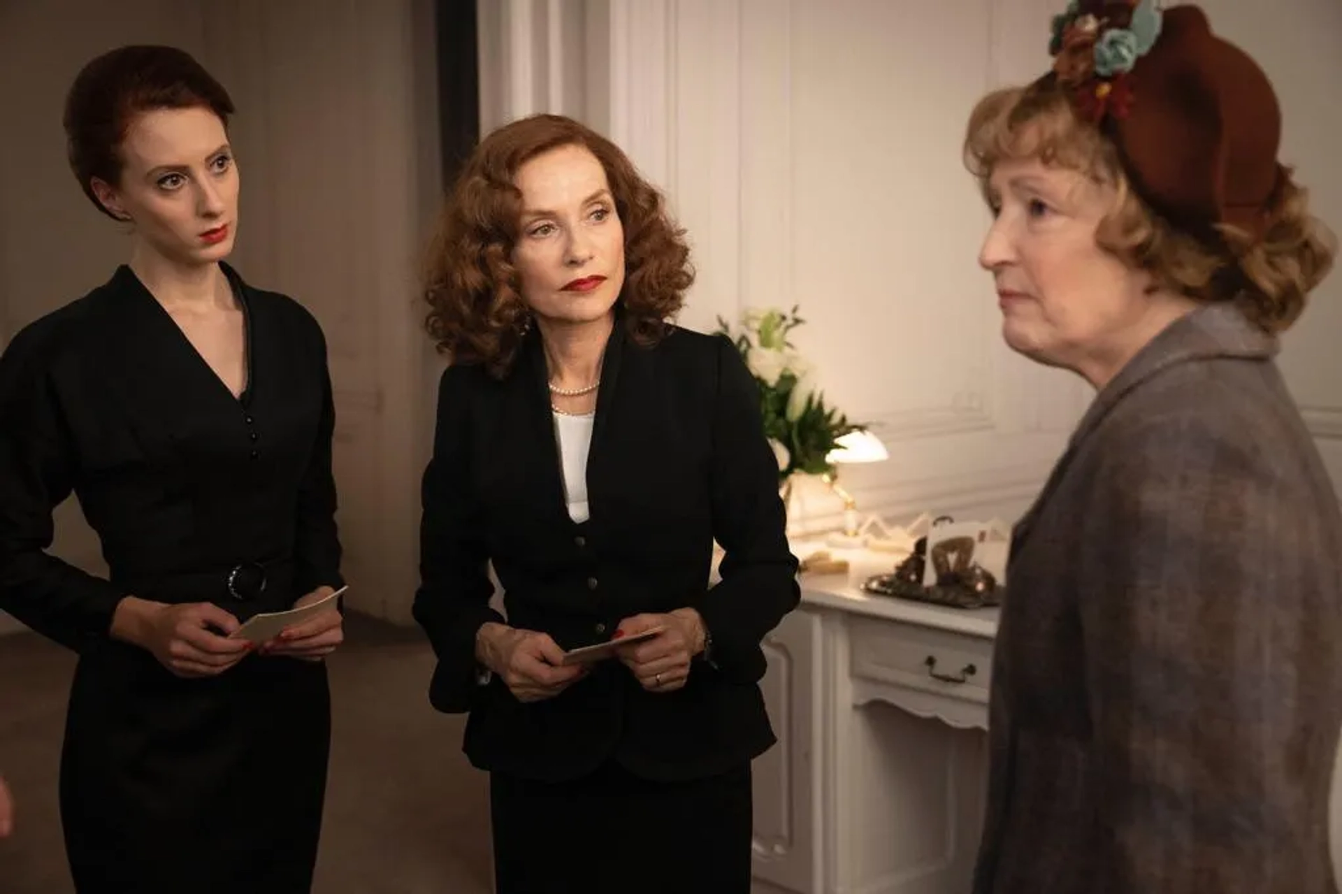 Movie still or Roxane Duran Isabelle Huppert and Leslie Manville shooting Mrs Harris Goes to Paris