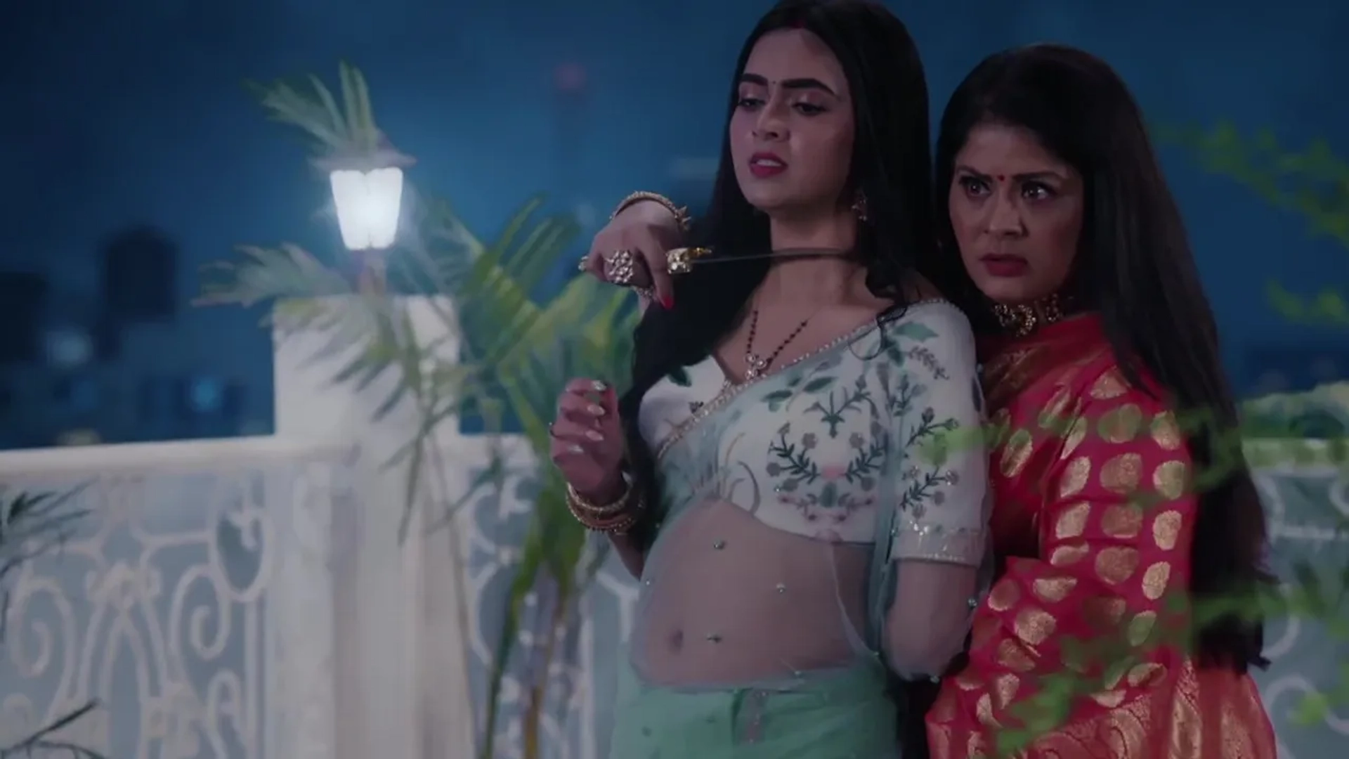 Sudha Chandran and Tejasswi Prakash in Naagin: Seema Threatens To Kill Pratha (2022)