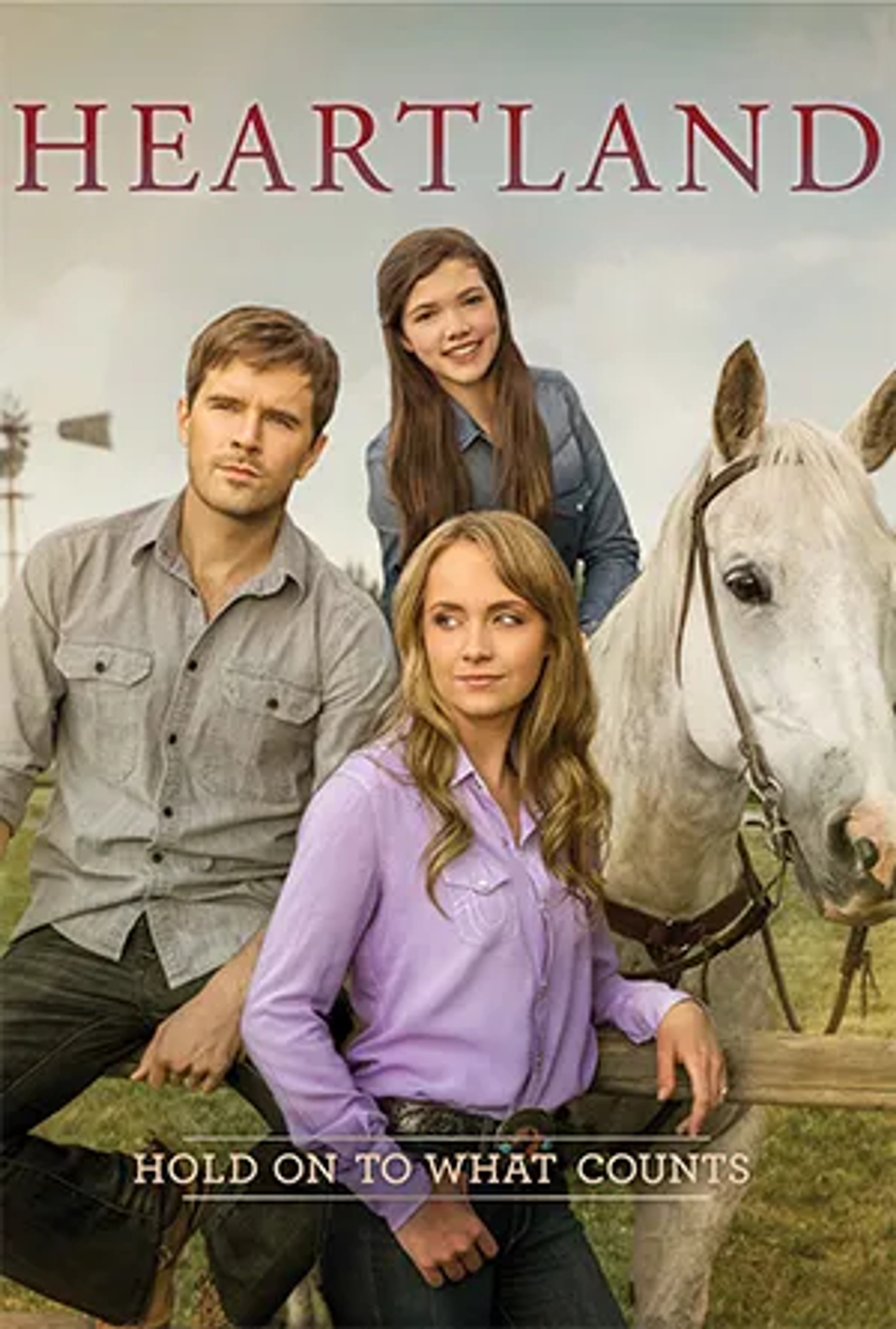 Graham Wardle, Amber Marshall, and Alisha Newton in Heartland (2007)