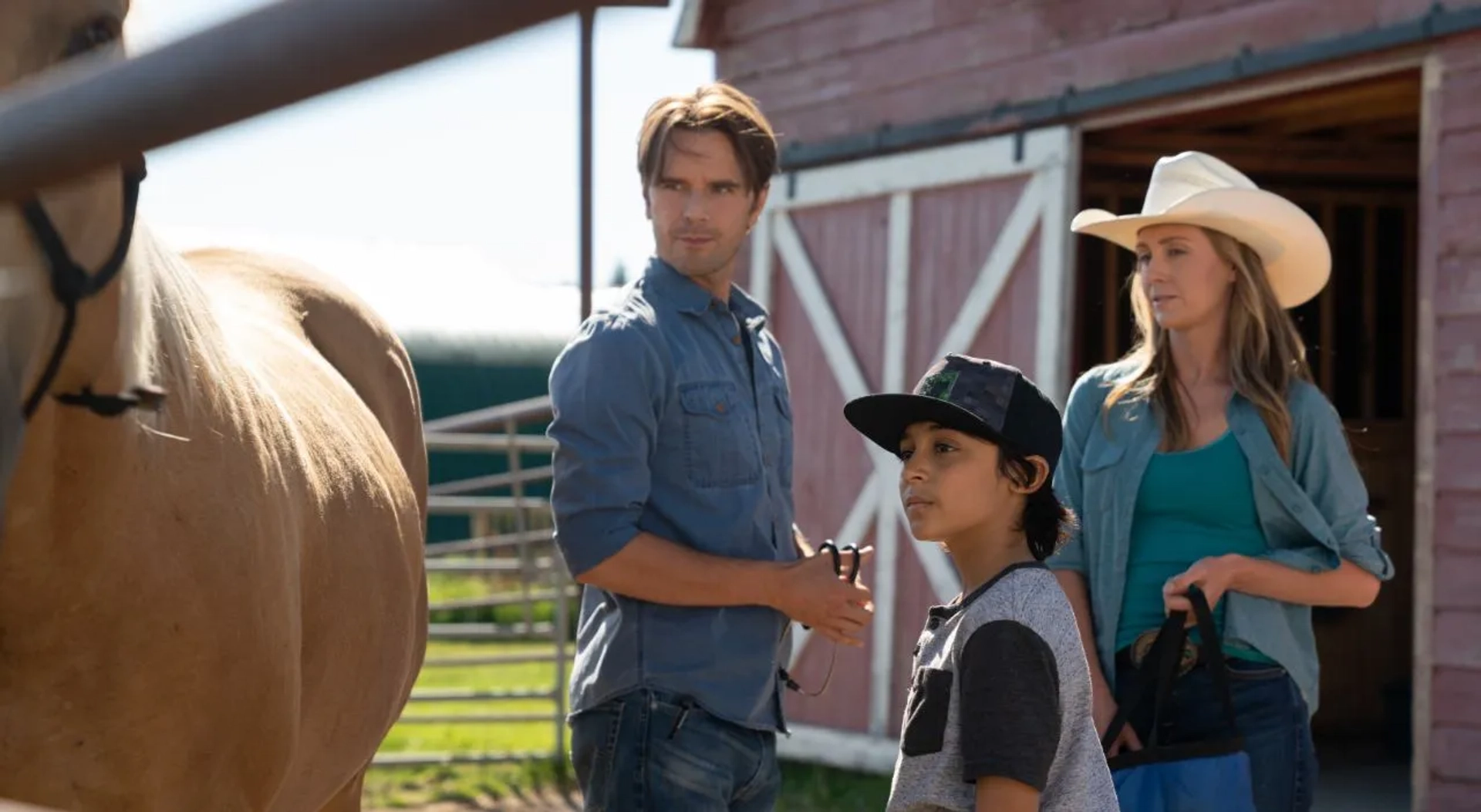 Graham Wardle, Amber Marshall, and Lucian-River Chauhan in Heartland (2007)