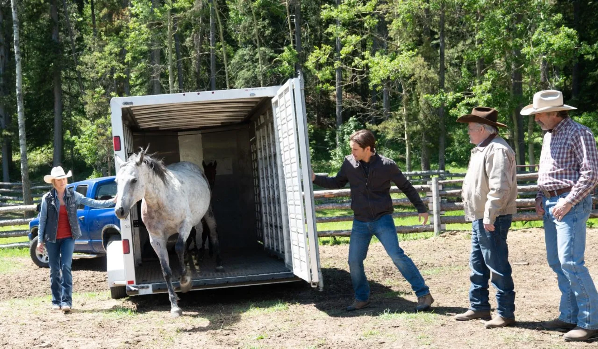 Nicholas Campbell, Shaun Johnston, Graham Wardle, and Amber Marshall in Heartland (2007)