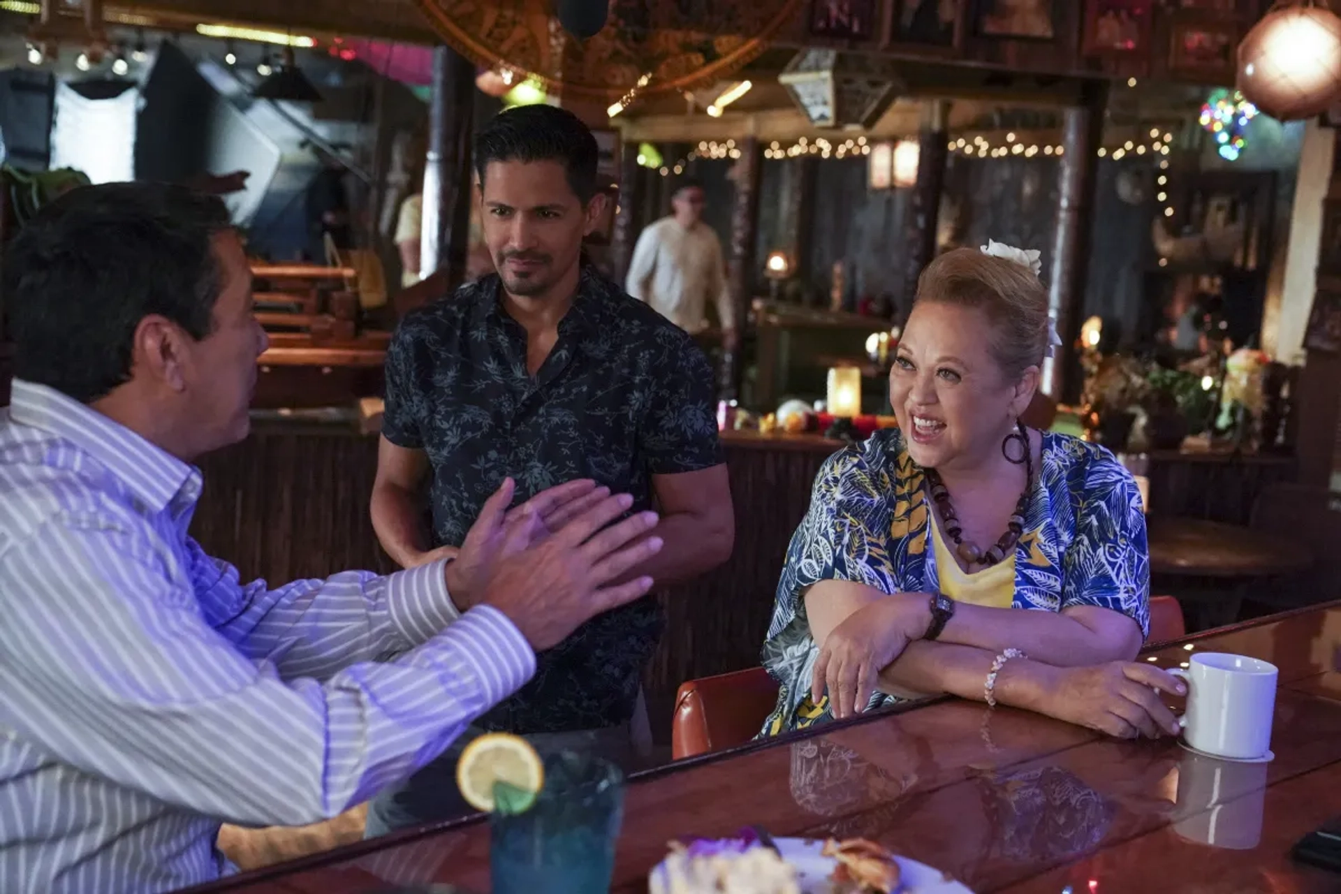 Jay Hernandez, Amy Hill, and Steven Michael Quezada in Magnum P.I.: Before the Fall (2021)