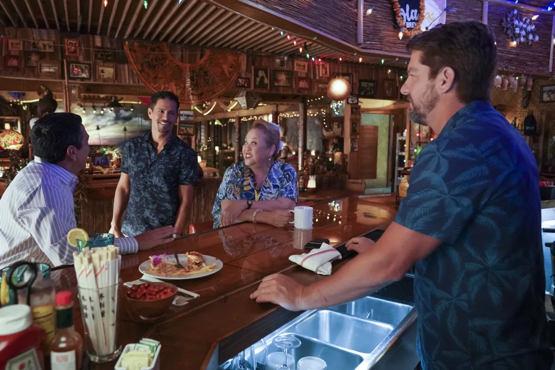 Jay Hernandez, Amy Hill, Zachary Knighton, and Steven Michael Quezada in Magnum P.I.: Before the Fall (2021)