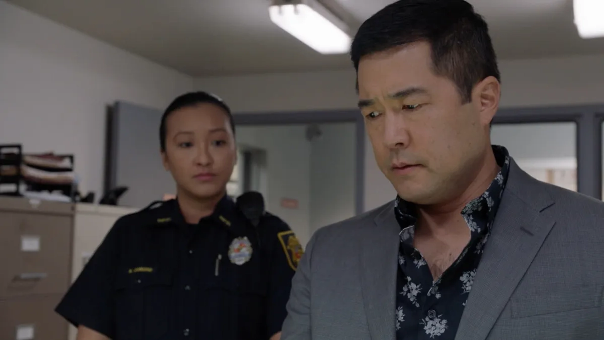 Tim Kang and Judy Nguyen in Magnum P.I.: Whispers of Death (2021)