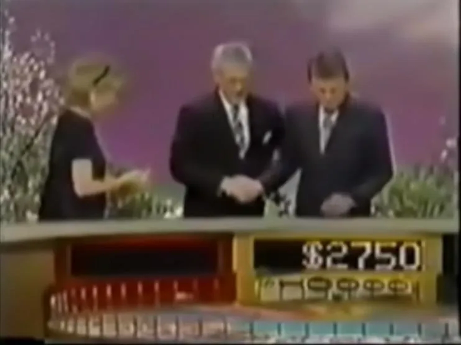 Vanna White, Pat Sajak, and Alex Trebek in Wheel of Fortune (1983)