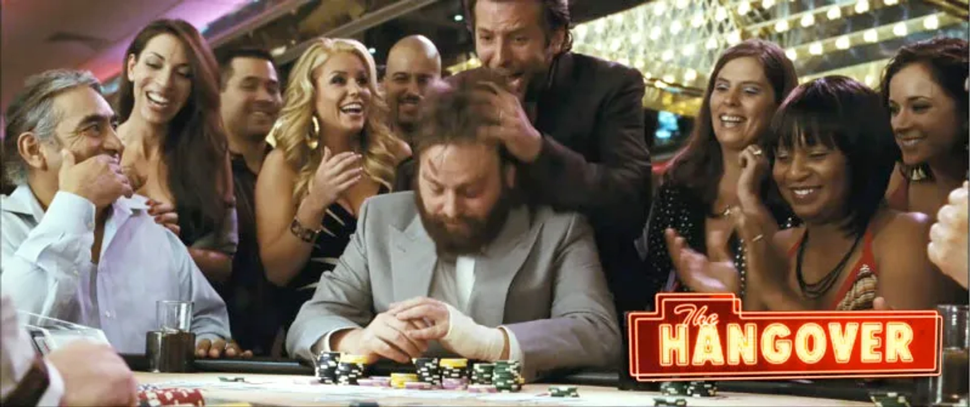 Carrie Keagan, Bradley Cooper and Zach Galifiankis in "The Hangover"