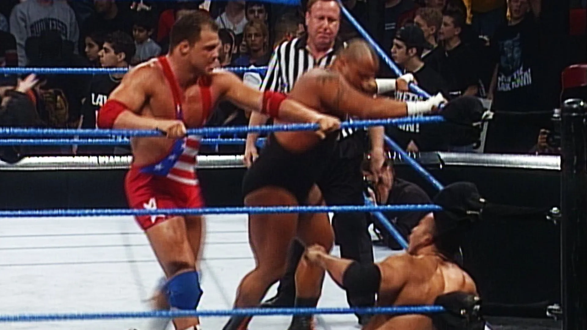 Kurt Angle, Dwayne Johnson, and Peter Senerchia in WWE Smackdown! (1999)