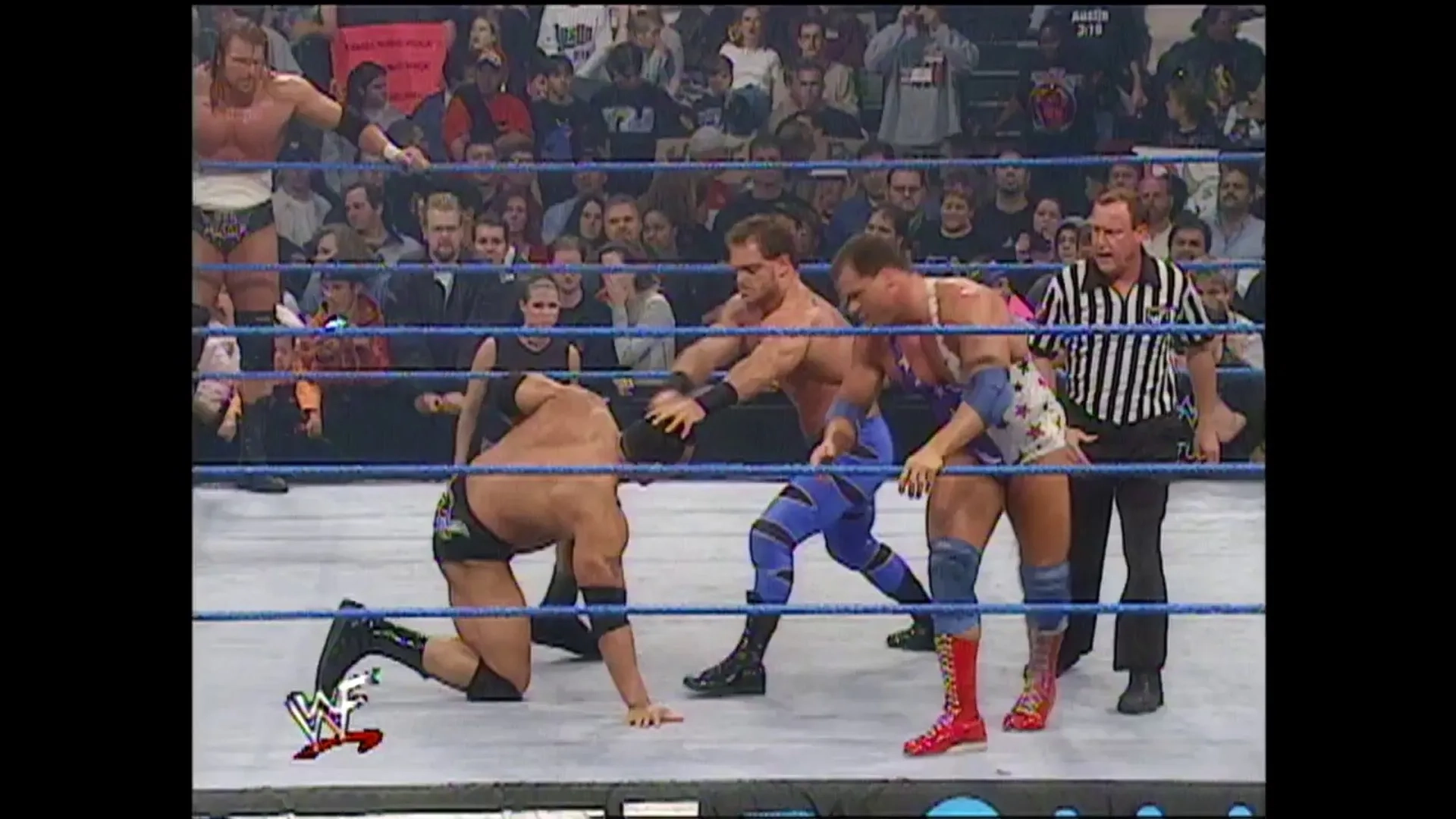 Kurt Angle, Chris Benoit, Dwayne Johnson, and Paul Levesque in WWE Smackdown! (1999)