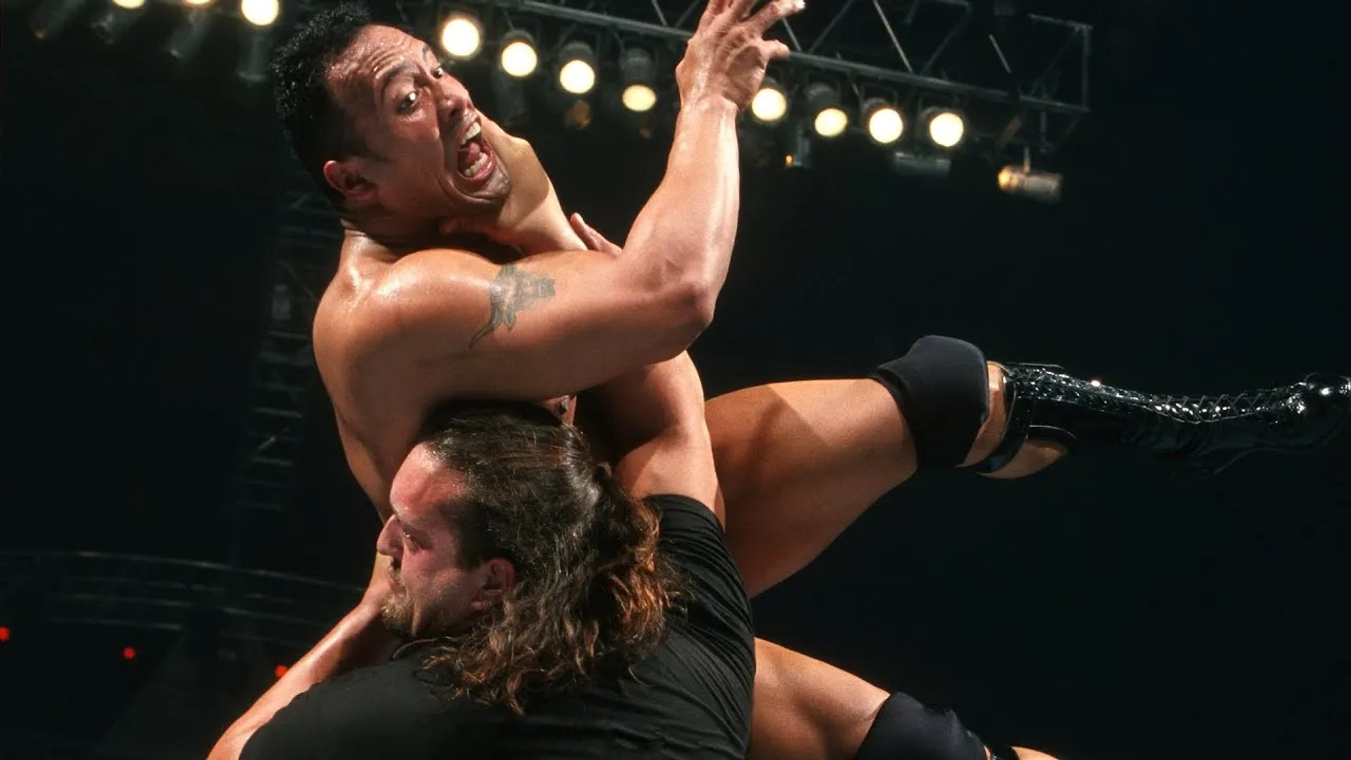 Dwayne Johnson and Paul Wight in WWE Smackdown! (1999)