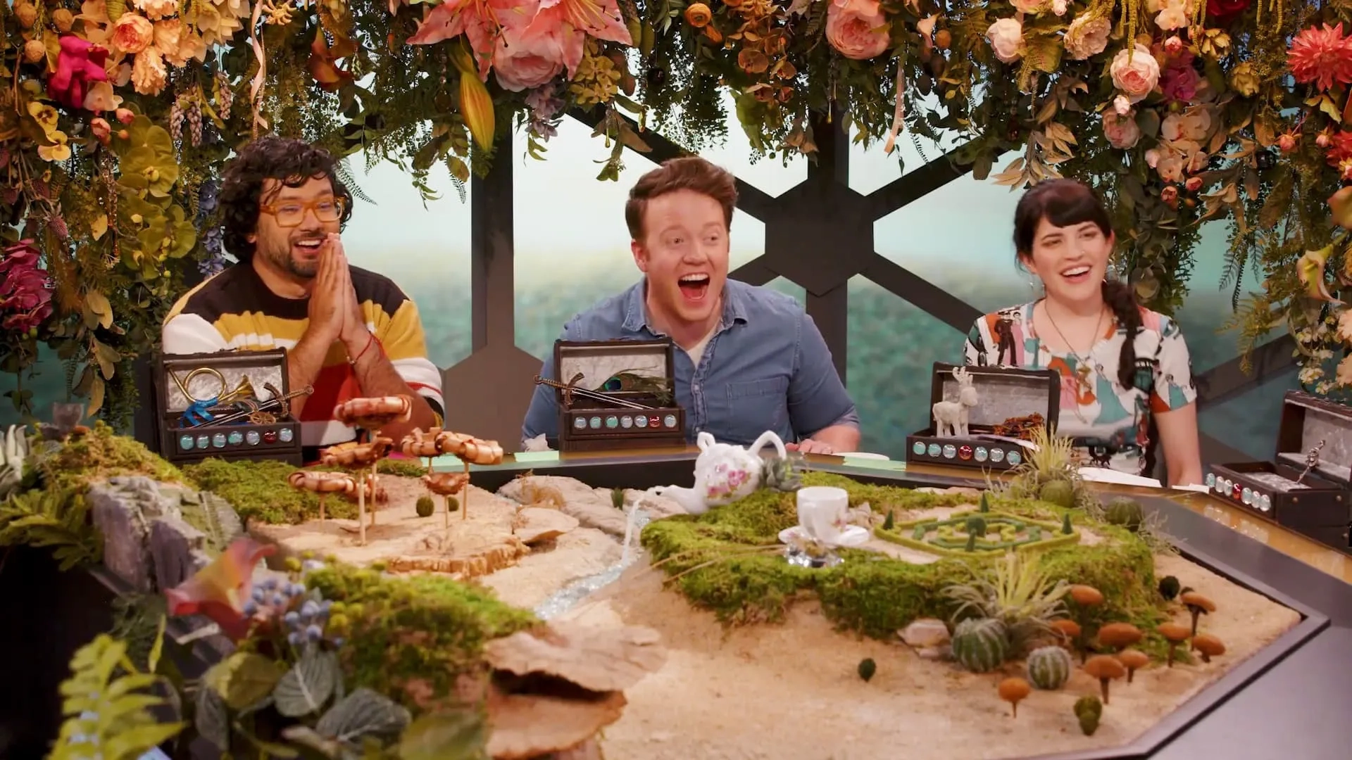 Emily Axford, Brennan Lee Mulligan, and Omar Najam in Dimension 20: Through the Hedge Maze (2022)